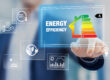 Energy Efficiency Rating And Eco Home Renovation Insulation Performance, Low Consumption Ecological House, Sustainable Development Concept With Expert Touching Icon On Screen